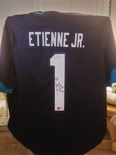 TRAVIS ETIENNE JR. BLK NIKE ON FIELD AUTHENTIC SIGNED JAGUARS JERSEY BECKETT COA