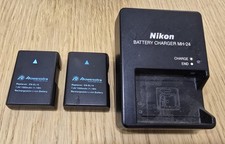 Nikon MH-24 battery charger and two compatible Powerextra EN-EL14 batteries.