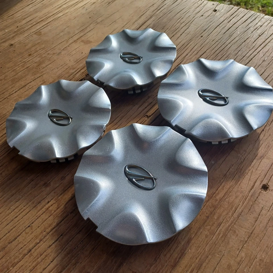 Oldsmobile Alero Juego de 4 tapas centrales, 1999-2004 parte # 9594366 repintadas Foto 2 de 3