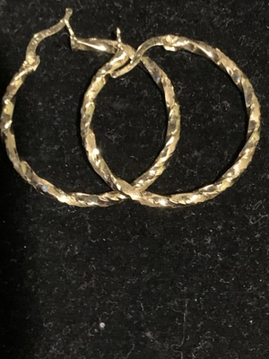 #ad 10k real Gold hoop earrings they are 2 inches big $350.00