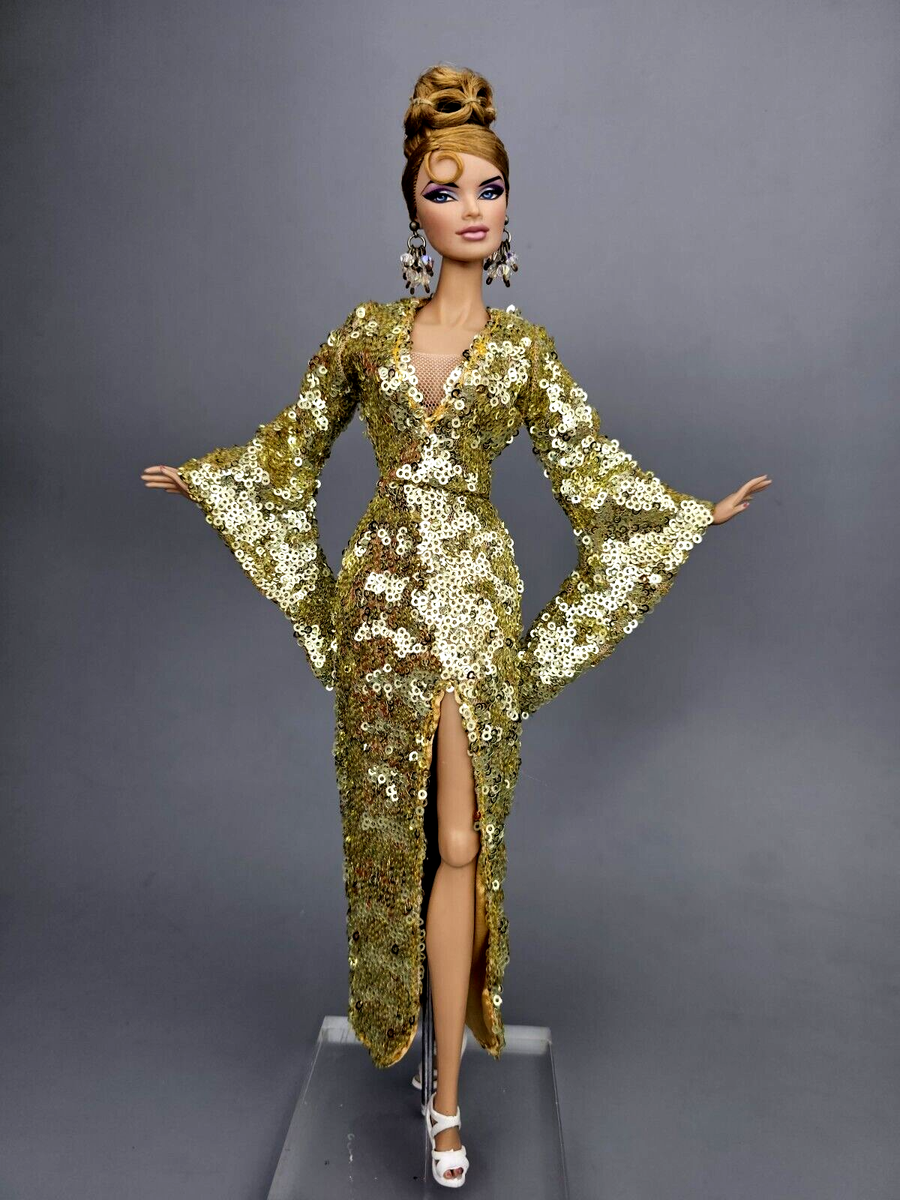 green emerald velvet dress Amazon.com: Barbie Fashion Model Collection Doll, Glam Gown : Toys & Games main image 0