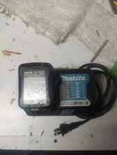 Makita DC10wd Charger With Lithium Ion Battery Battery Number BL 1021b 12 Volt
