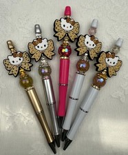 Custom beaded pens. H Kitty  Bow Gifts. Journal. Basket filler. collect.