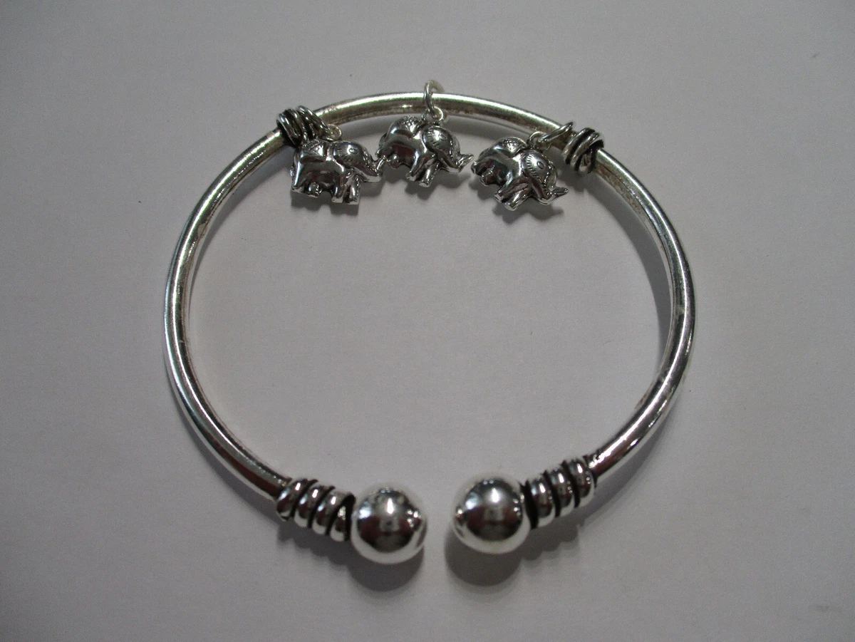 Tennis bracelet with charms deals