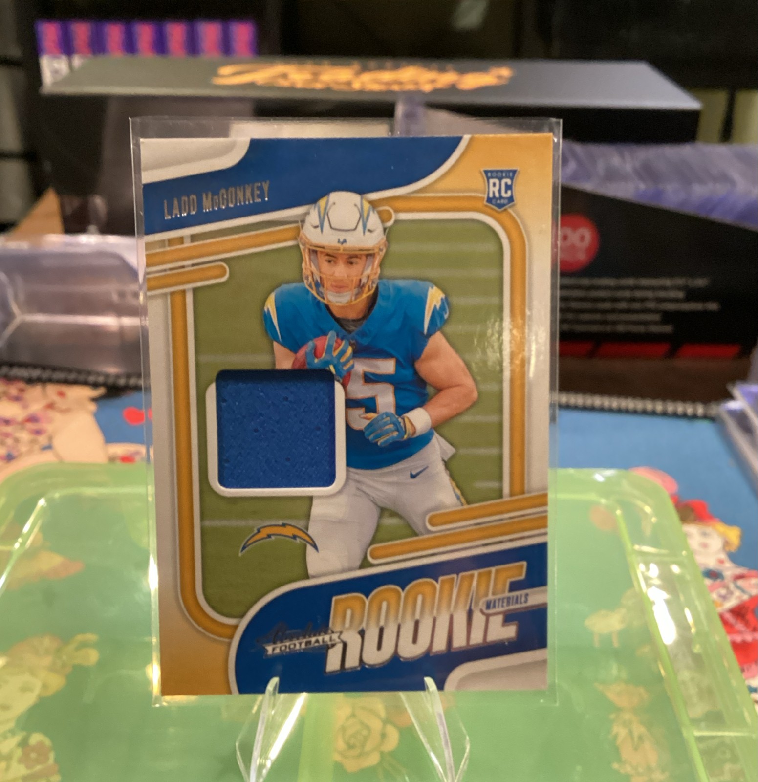 2024 Panini Absolute - Absolute Rookie Materials Ladd McConkey #ARM-LMY (MEM,...