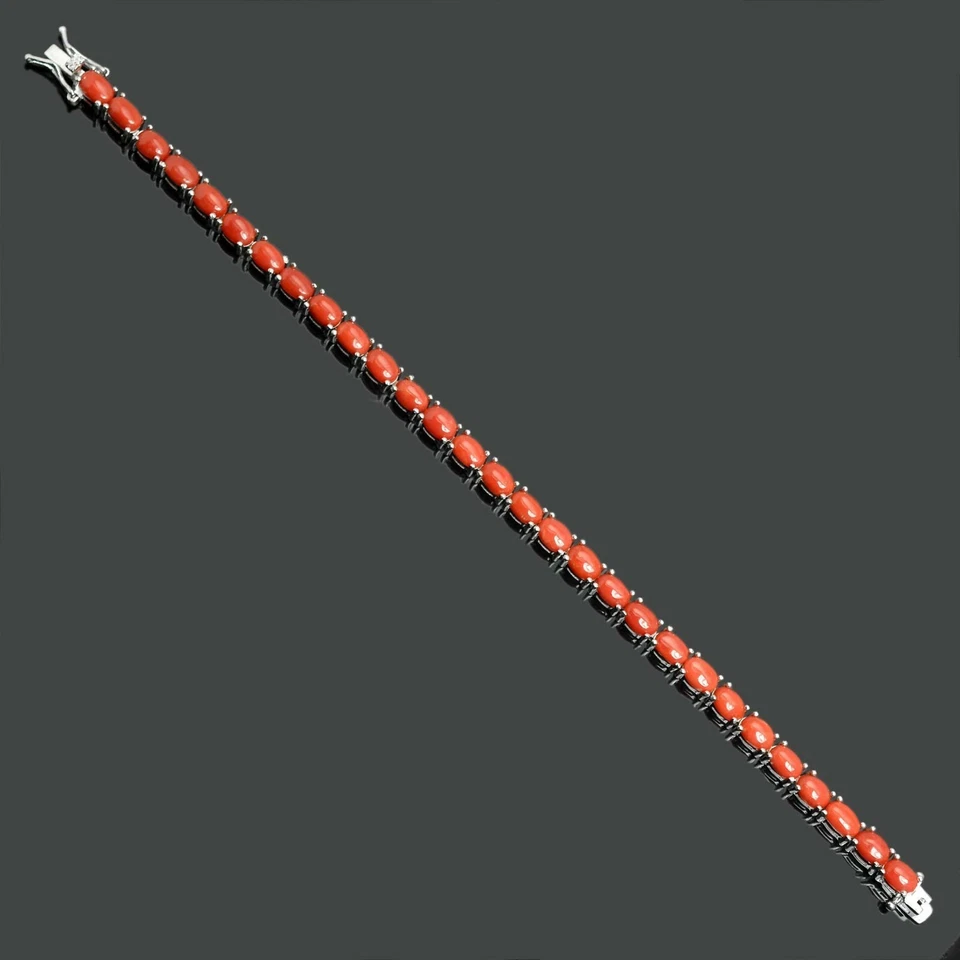Brazalete de tenis de plata de ley 925 con piedras preciosas de coral creadas en laboratorio de corte ovalado de 9 quilates Foto 4 de 4
