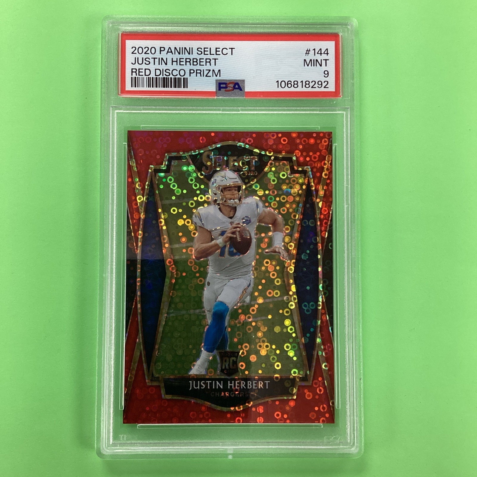 2020 Panini Select Premier Level Justin Herbert #344 Red Disco Prizm /49 PSA 9