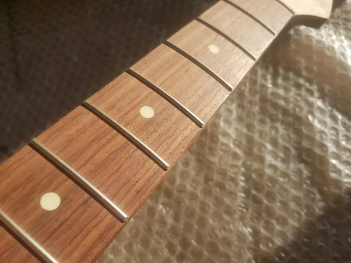 Slab board neck outlet