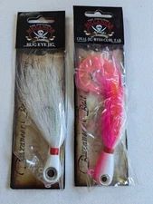 Buccaneer Bait Co jigs, pack of 2. Bug Eye and Oval with curl tail.