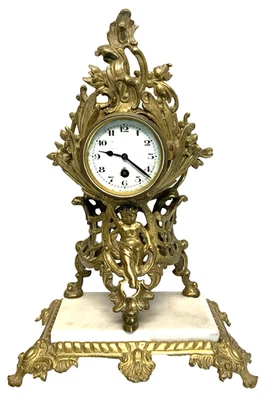 Jolie PENDULETTE bronze doré angelot putti XIXème fonctionne - Photo 1/4