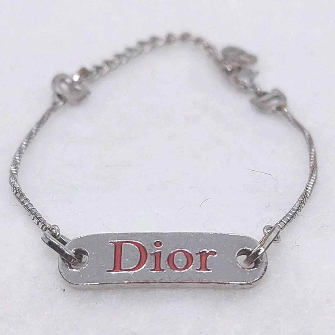 Bracelet plaque logo Christian Dior accessoire argent bijou femme vintage