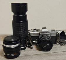 Minolta SRT 201 film camera w Multiple Lens and Strap Untested As Is No Returns