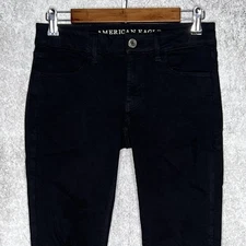 American Eagle womens distressed jegging size 4 stretch solid black mid rise
