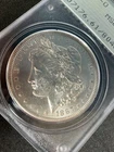 1887 O Morgan Dollar MS61 Rattler Holder