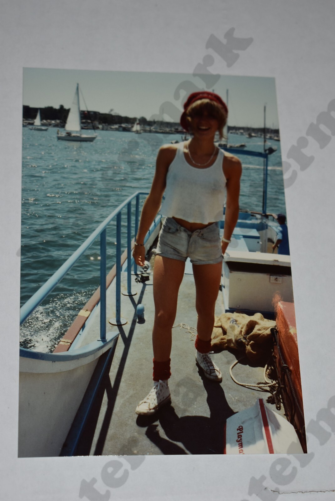 candid of cute blonde woman in denim shorts white topVINTAGE PHOTOGRAPH
