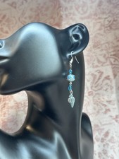 handcrafted blue glass beaded shell dangle earrings with silver plated hooks