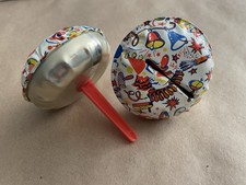 2 Vintage U.S. Metal Toy Mfg. Co. Tin Litho Bell Shaped Noise Maker