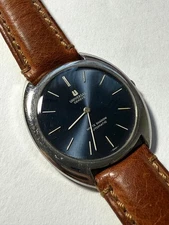 Universal Geneve White Shadow Automatic Watch Blue Dial Tonneau Case