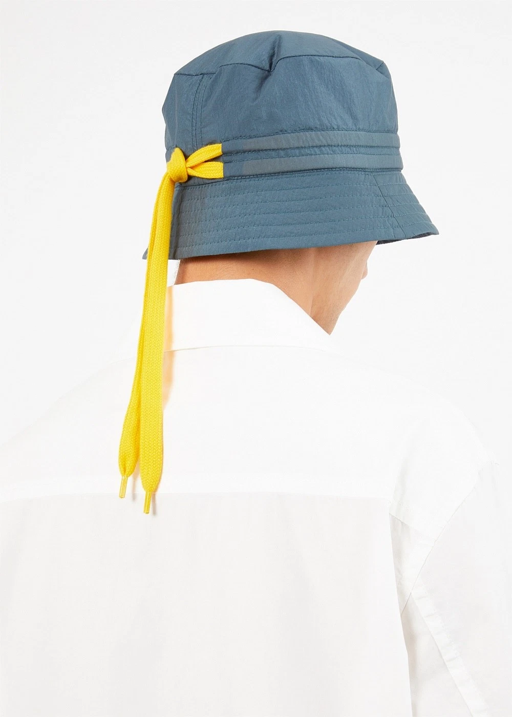 Craig Green blue/grey 'Tunnel' bucket hat with contrasting yellow drawstring .