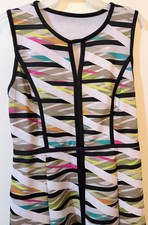 Women's dress, medium, sleeveless, knee length, pockets, heavy material.