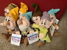 Vintage Disney plush toys including seven dwarf sets