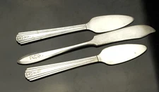 Vintage Community Plate butter knife and  Two Avon butter knives.