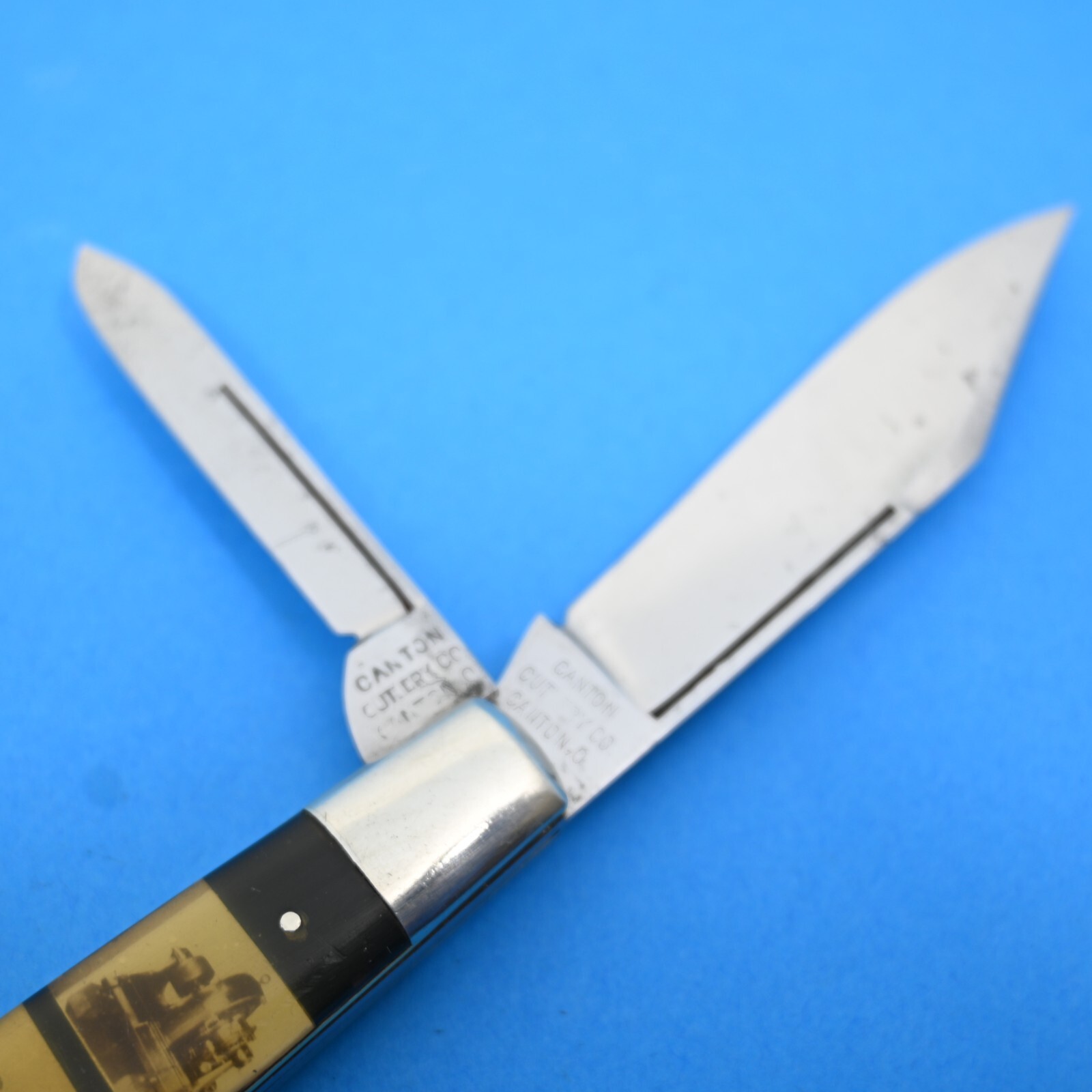 CANTON CUTLERY CO., CANTON, O. LARGE SLEEVEBOARD CELLULOID MINTY JACK