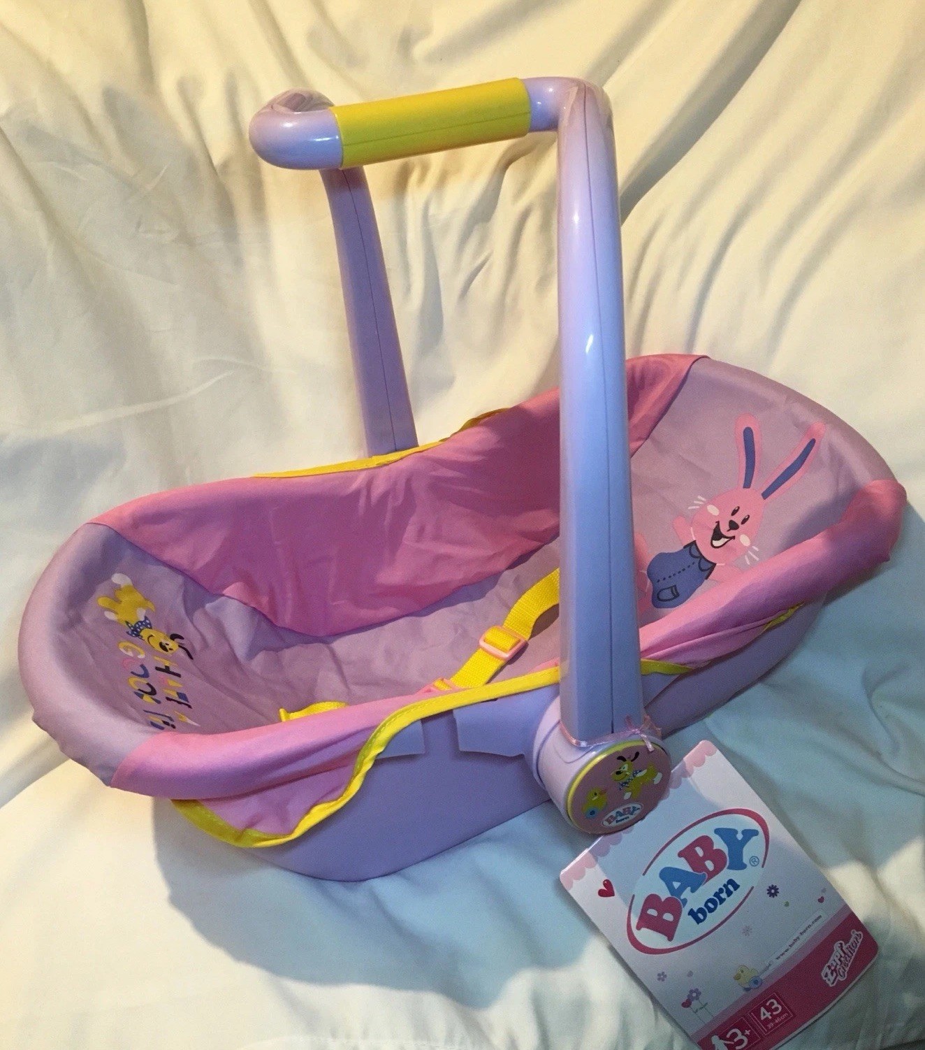 Seggiolino auto per bambola Baby Born rosa e viola