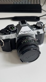 Canon AE 1 Program Analog Spiegelreflexkamera mit 50mm 1:1 8 Objektiv Set