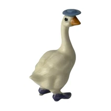 Retired Hagen Renaker Mother Goose with Blue Hat And Purple Shoes 2.25"