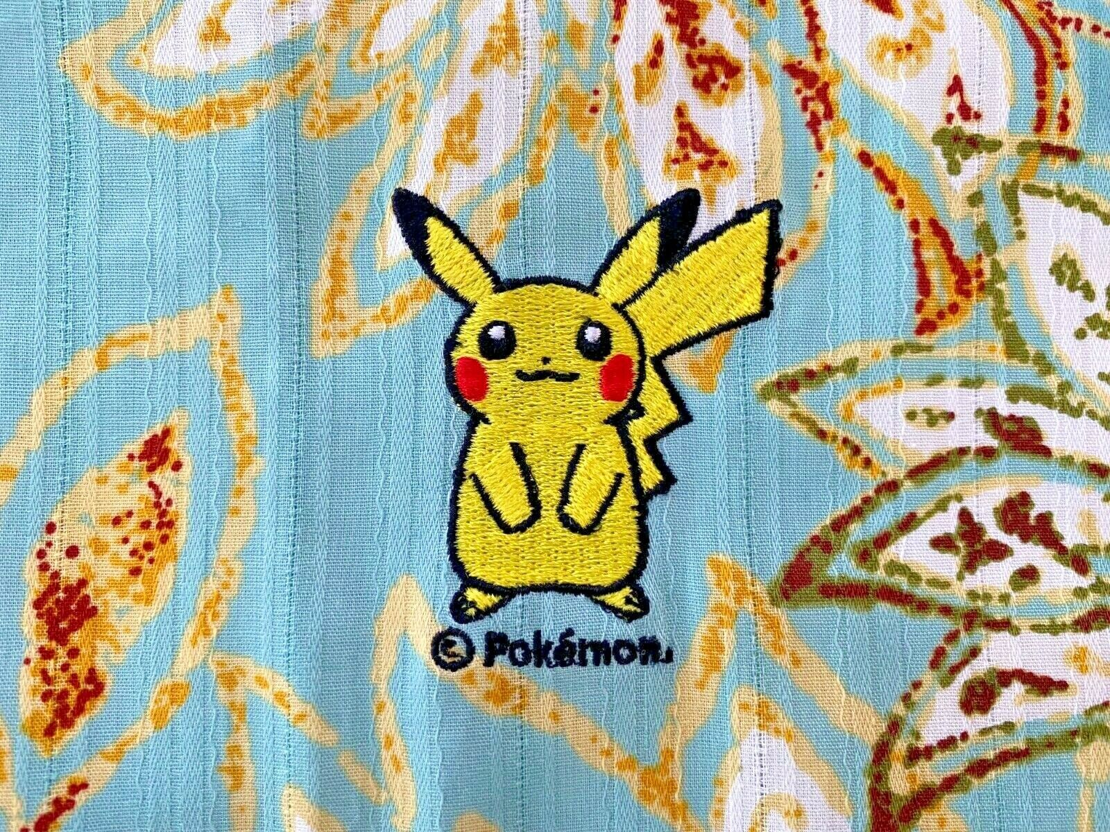 Pikachu wearing an Okinawan kariyushi shirt and Shiny Corsola - Leek Duck