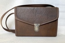 Vintage Hard Leather Brown Case for small compact cameras and accessories.