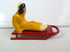 Vintage Barclay Lead Figure Yellow Girl on Red Sled