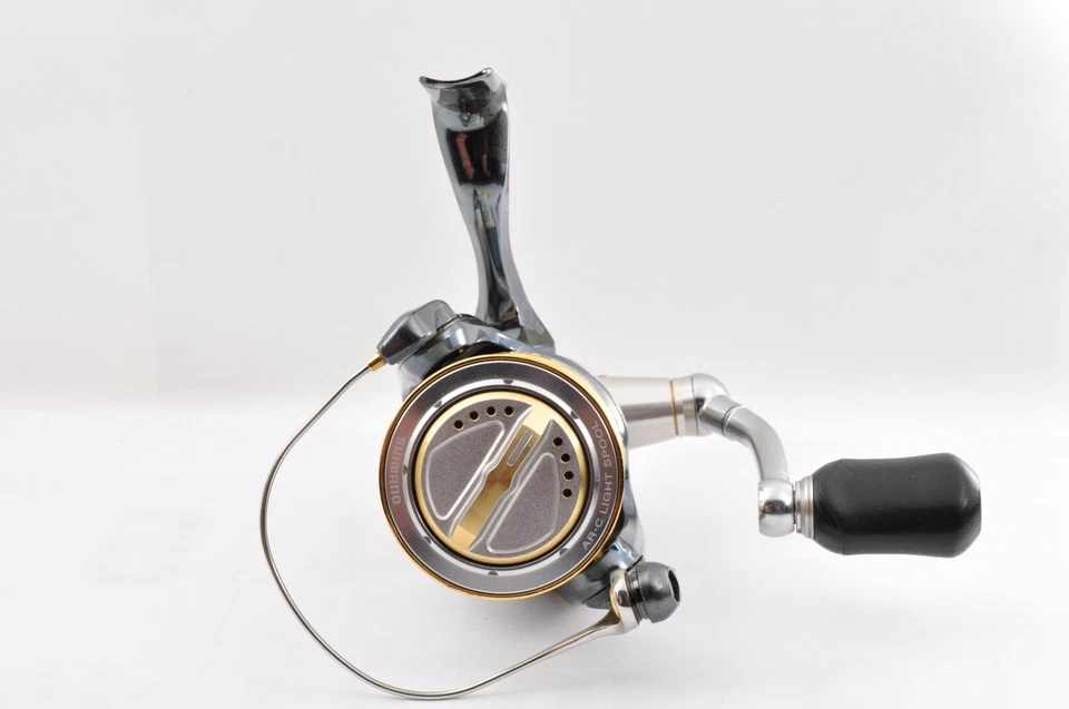 Carrete giratorio de pesca Shimano 10 Stella 2500 5,3:1 225 g sin bolsa gris usado manual Foto 3 de 4