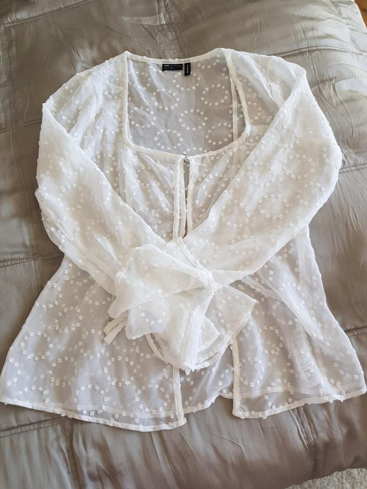 Pretty Brand new white sheer ASOS Design top in size 10 with front ties.