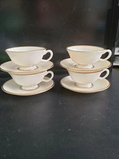 VINTAGE LENOX MANSFIELD IVORY WITH GOLD TRIM 4 FOOTED COFFEE CUP AND SAUCER