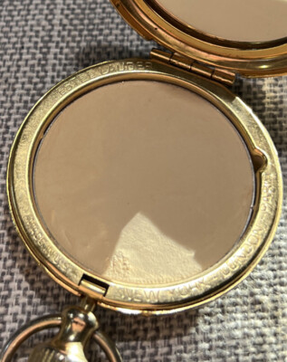 Vintage Estee Lauder Gold Tone Scroll Metal Pocket Watch  display picture 1