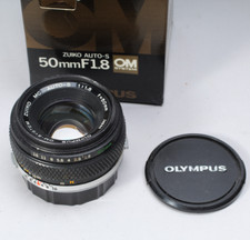 OLYMPUS OM 50MM F/1.8 LENS W CAPS IN THE BOX CLEAN BUT HAS LIGHT HAZE