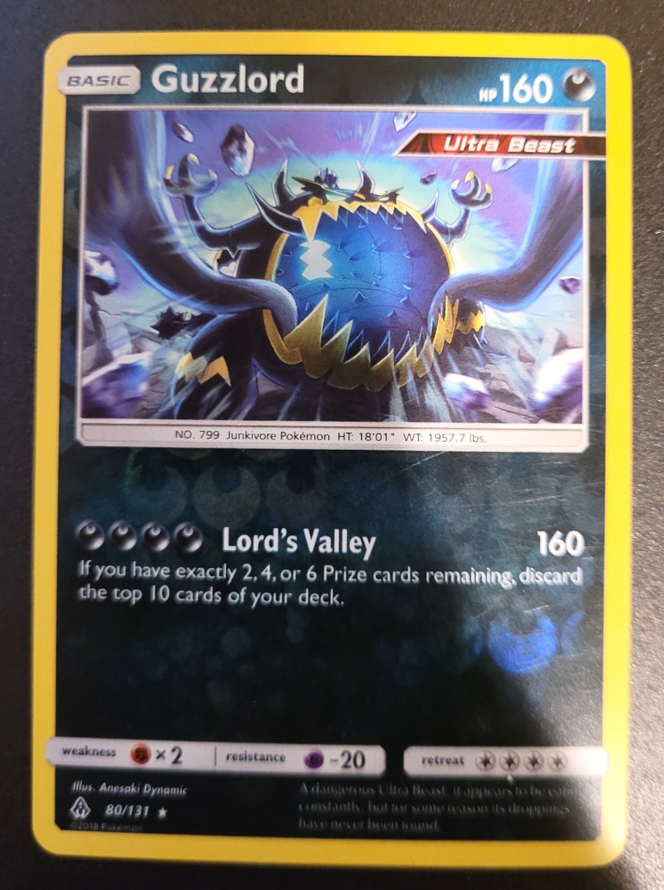 Pokemon S&M Forbidden Light Guzzlord Reverse Holo 80/131 NM/M Condition