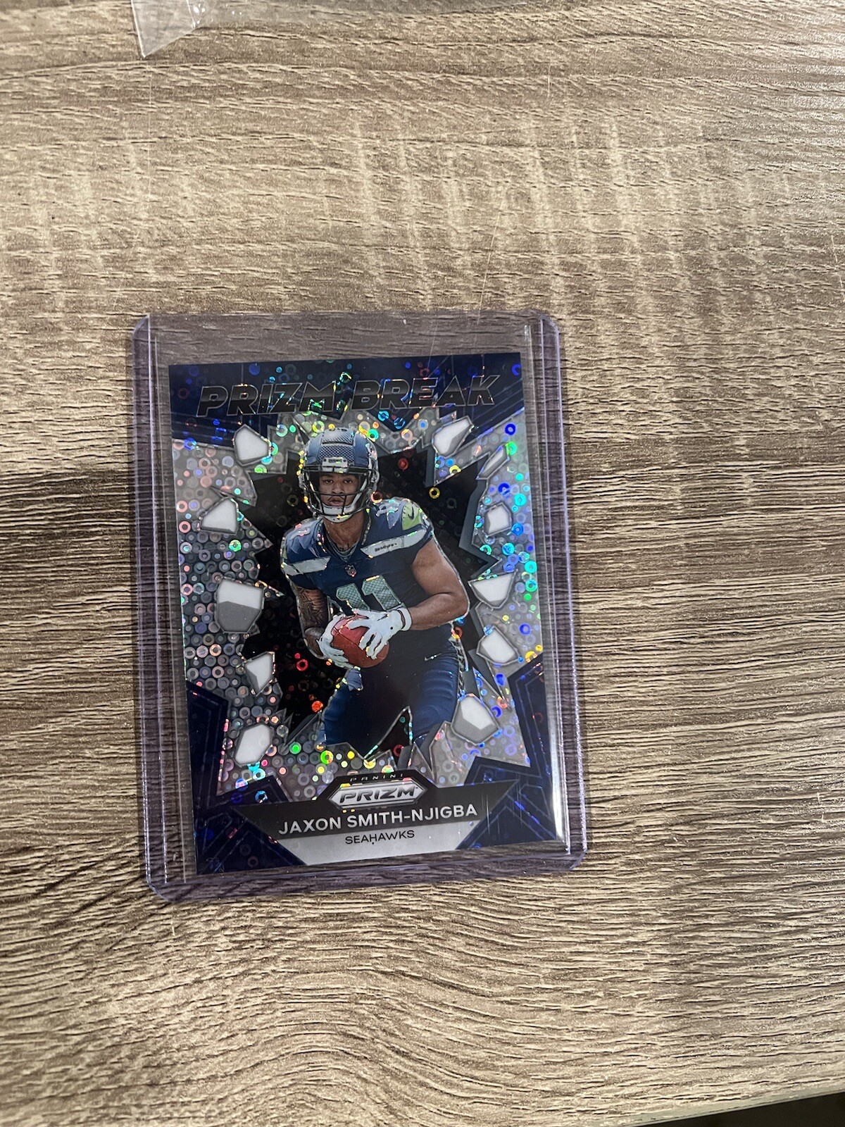 2023 Panini Prizm Jaxon Smith-Njigba Prizm Break RC No Huddle Silver Disco Prizm