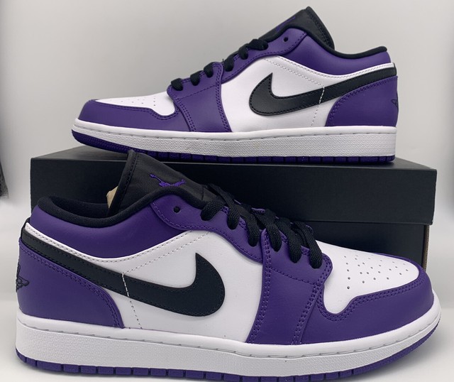 purple and white nike trainers