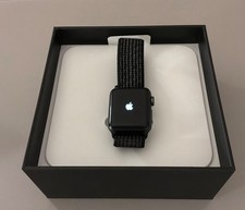 Apple Watch Nike + Series 3 38mm Black face with black Nike sports loop strap.