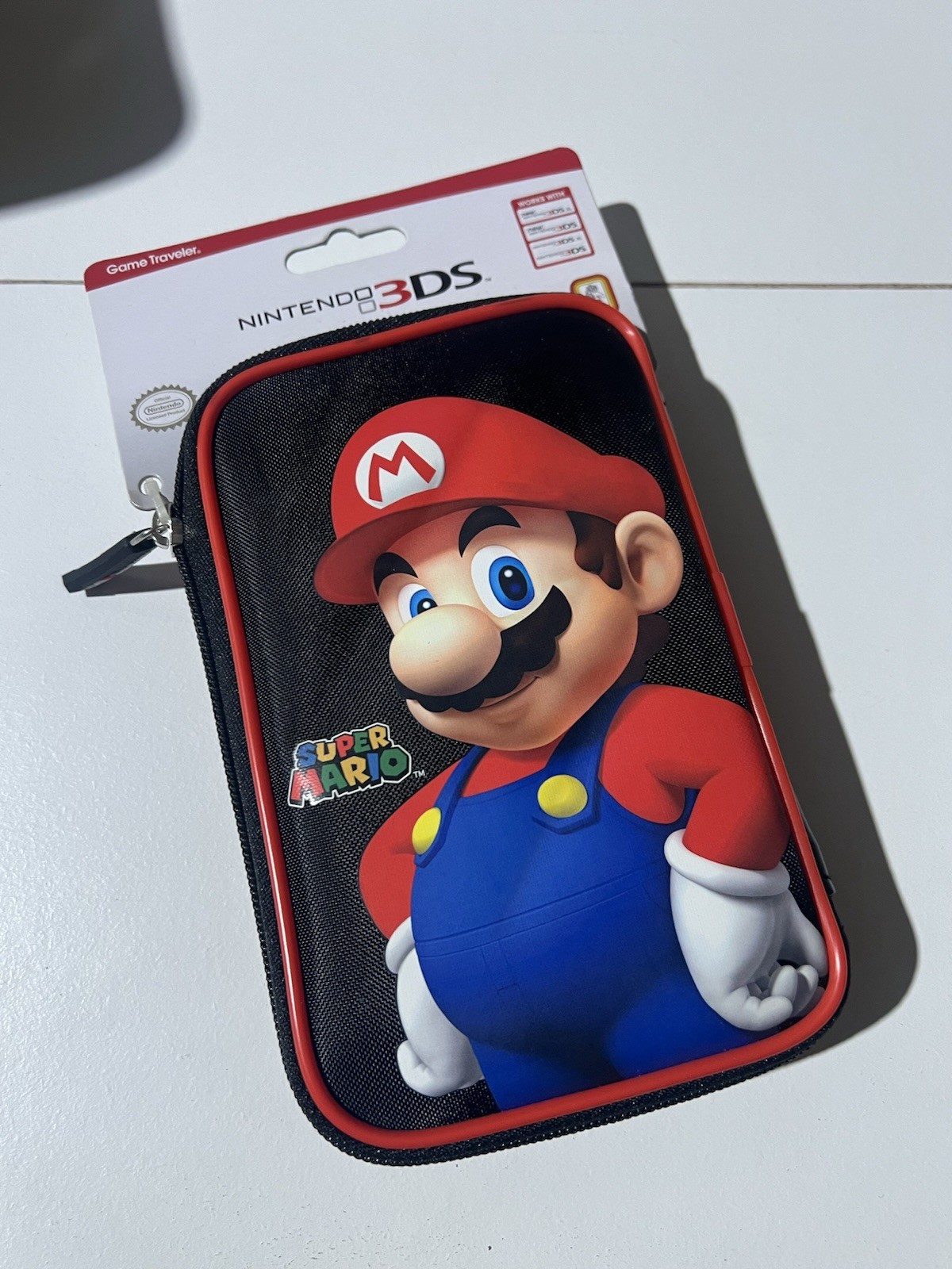 Housse Nintendo 3DS Mario en EVA rigide avec double fermeture et rangement cartouches