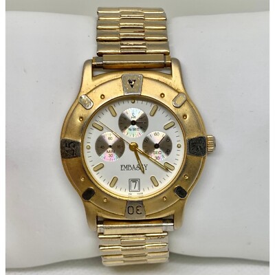 Vintage Embassy Swiss men date wrist watch gold tone quartz analog 38mm running