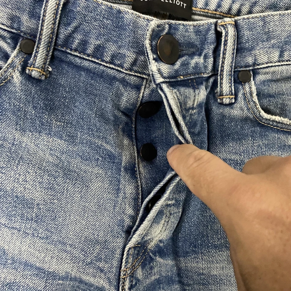 Pantalones de mezclilla John Elliott para hombre 31 azules desgastados dobladillo rasgado botón mosca hechos en Japón Foto 2 de 4