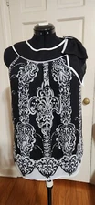 Misty & May Top Size Medium with Bow on the shoulder. Black & White No Sleeve