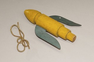 ORIGINAL CIRCA 1930S BUCK ROGERS ? WOODEN ROCKET TOY APPROXIMATELY 4" LONG