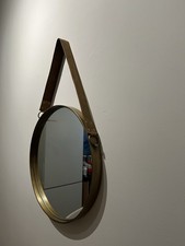 Round Mirror With Bronze Frame And Decorative Leather Strap. John Lewis.