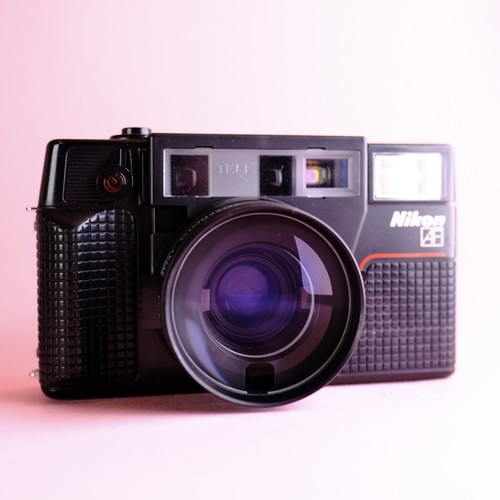 Nikon L35AF2 fotocamera punta e scatta pellicola - ottimo stato funzionante e teleobiettivi - Foto 3 di 17