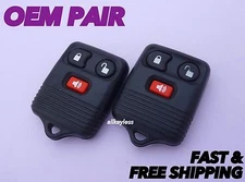 Pair of OEM FORD LINCOLN TRUCK SUV keyless entry remote key fob transmitters
